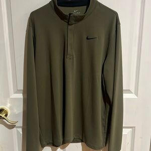 This green Nike pull over with blacks accents is in great shape